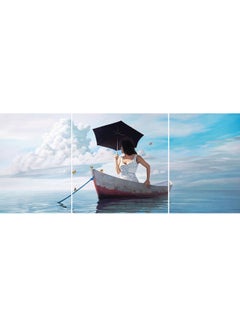 Buy 3-Piece Girl In Boat With Umbrella Canvas Print Set Multicolour 50x120cm in UAE