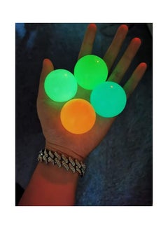 Buy 4-Piece Soft And Squeeze Stress Relief Novelty Sticky Glow In Dark Ball in Saudi Arabia