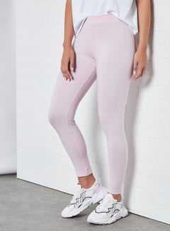 Buy Elastic Waist High-Rise Skinny Fit Plain Leggings Purple in Saudi Arabia