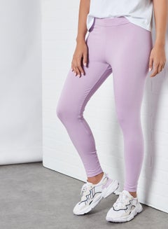 Buy Elastic Waist High-Rise Skinny Fit Plain Leggings Crocus Petal in Saudi Arabia