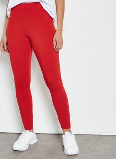 Buy Elastic Waist High-Rise Skinny Fit Plain Leggings Red in Saudi Arabia