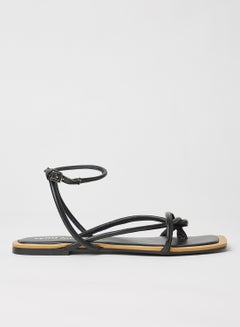 Buy Strappy Leather Flat Sandals Black in Saudi Arabia