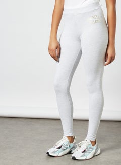 Buy Metallic Logo Leggings Grey in UAE