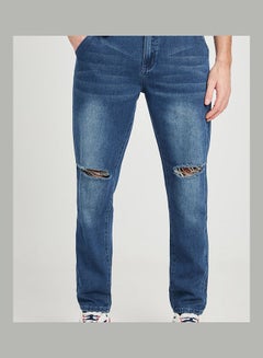 Buy Sliced Knee Detail Slim Fit Jeans Blue in Saudi Arabia