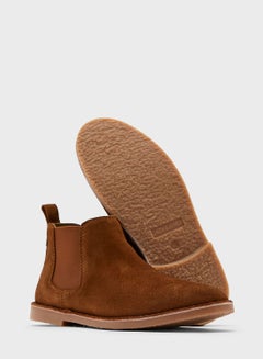 Buy Solid Pattern Slip-On Casual Boots Brown in UAE