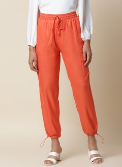 Buy Solid Pattern Elasticated Hem Pants Orange in UAE