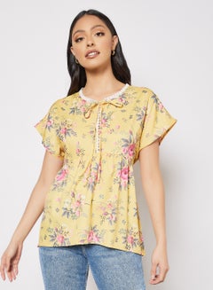 Buy Tie Neck Floral Print Blouse Yellow in UAE