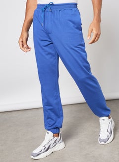 Buy Casual Sweatpants with Elasticated waistband and back decorated pockets Blue in UAE