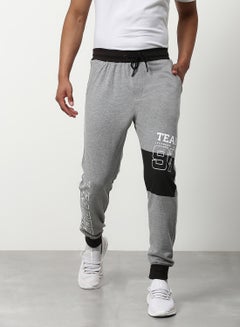 Buy Regular Fit Joggers Grey Melange/White in UAE