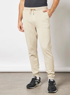 Buy Solid Sweatpants Beige in UAE