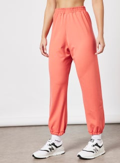 Buy Elasticated Baggy Joggers Peach in UAE