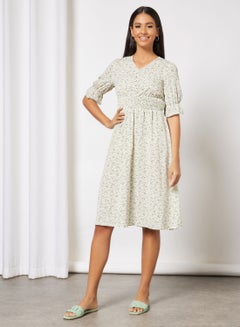 Buy Casual Half Sleeve Knee Length Dress With V-Neck Waist Smocking Floral Print Pattern Light Yellow in UAE