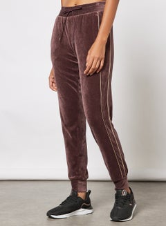 Buy Iconic T7 Velour Sweatpants Brown in UAE