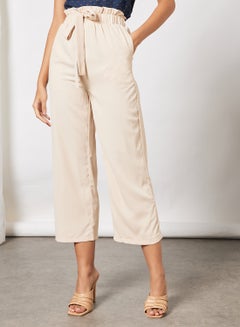 Buy Women Paper Bag Elastic Waistband Bowknot Belted Pants Beige in UAE