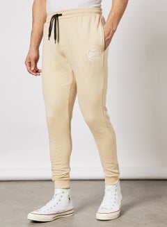 Buy Mid-Rise Casual Joggers Ivory Beige in UAE