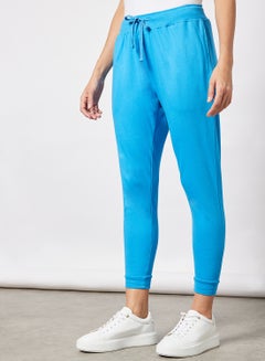 Buy Women Casual Comfortable Regular Fit Mid Rise Elasticated Waist Joggers with Ribbed Bottom Ibiza Blue in Saudi Arabia