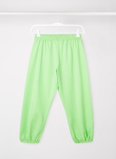 Buy Elasticated Baggy Joggers Green in Saudi Arabia