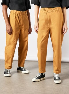 Buy Unisex Tapered Chino Pants Mustard in Saudi Arabia