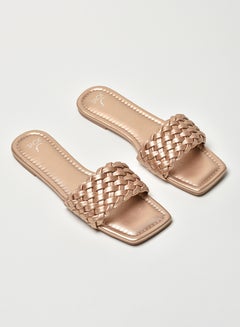 Buy Braided Broad Strap Slip-On Flat Sandals Rose Gold in Saudi Arabia