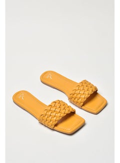 Buy Braided Broad Strap Slip-On Flat Sandals Mustard in Saudi Arabia
