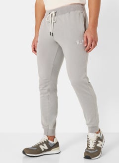 Buy Eco-Friendly Essential Sweatpants Light Grey in UAE