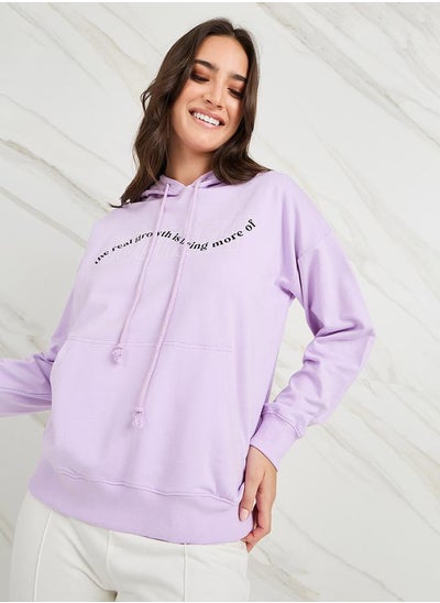 اشتري Oversized Slogan Print Regular Length Hoodie في السعودية