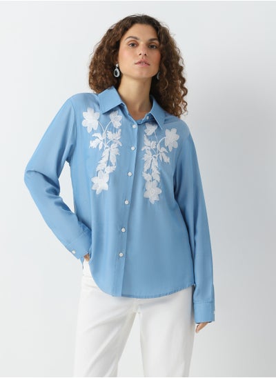 Buy Women's Viscose Floral embroidery blouse with pearls buttons Stretch Blue in UAE