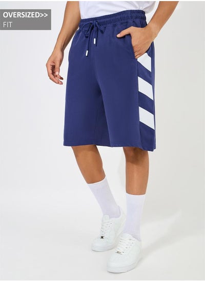 اشتري Oversized Cotton Terry Block Striped Shorts في السعودية