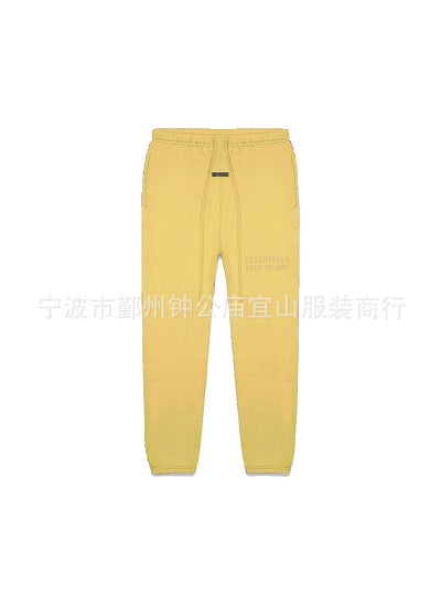 اشتري 2023 SS Silicone Print FOG Essentials Sweatpants Goose yellow LightTuscan في الامارات