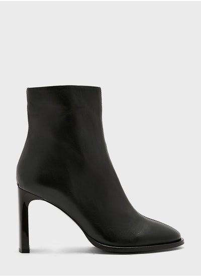 Buy Curved Stil Ankle Boots in UAE