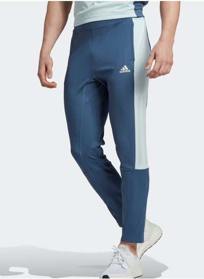 Buy 3 Stripe Training Sweatpants in UAE