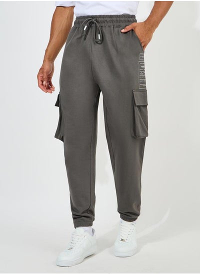 Buy Graphic Print Oversized Cargo Joggers in Saudi Arabia