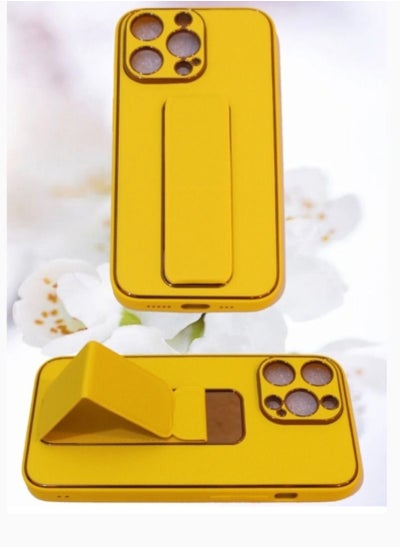 Buy Leather Back Case Cover With Camera Protector And Finger Grip And Stand For iPhone 12 Promax Yellow Color in Saudi Arabia