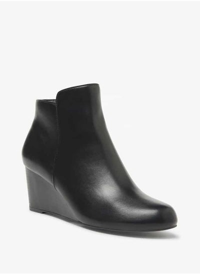 اشتري Women Solid Ankle Boots with Zip Closure and Wedge Heels في السعودية