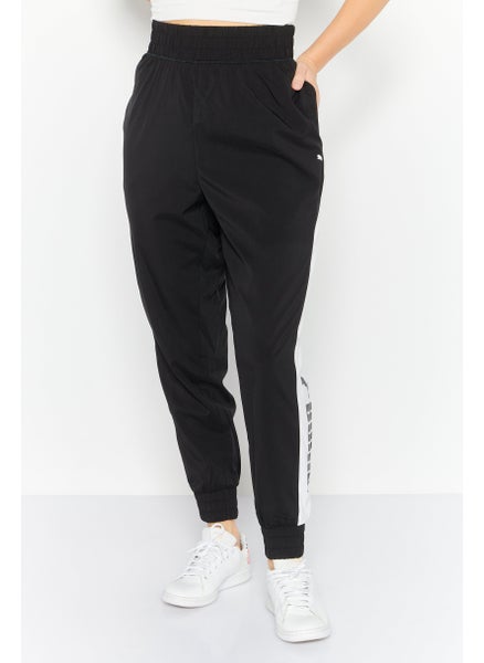 Buy Women Sportswear Fit Training Track Pants, Black/White in UAE