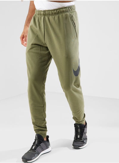 اشتري Dri-Fit Taper Swoosh Pants في الامارات