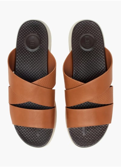 Buy Men Textured Slip-On Cross Strap Sandals in UAE