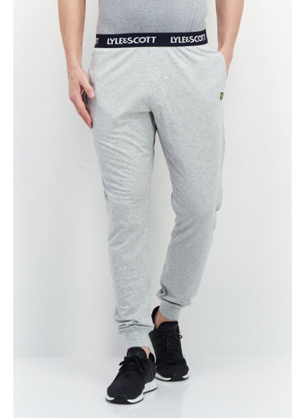 Buy Men Regular Fit Brand Logo Jogger Pants, Grey in Saudi Arabia