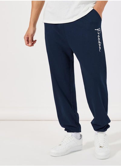 Buy Text Print Oversized Joggers in Saudi Arabia