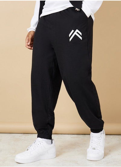 Buy Oversized Fit Jogger With Minimal Print & Elasticated Hem in Saudi Arabia