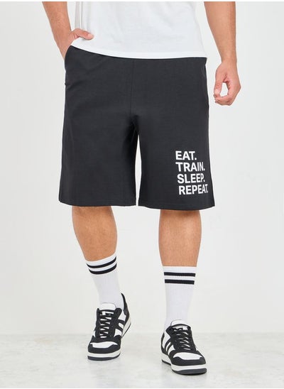 Buy Oversized Slogan Print Hem Terry Athleisure Shorts in Saudi Arabia