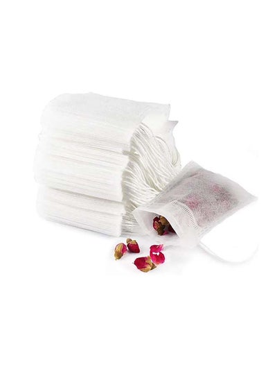Buy Tea filter bags 100 pack disposable empty tea bags, loose leaf tea infuser drawstring seal tea bags multipurpose non-woven fabric sachet bags for coffee spice herbs in Egypt