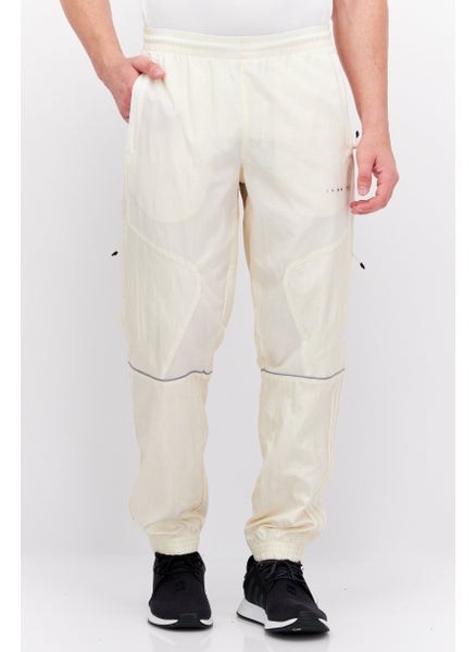 اشتري Men Sportswear Fit Training Track Pants, Off White في الامارات