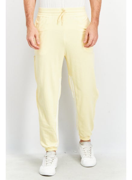 اشتري Men Sportswear Fit Training Sweatpants, Yellow/White في الامارات