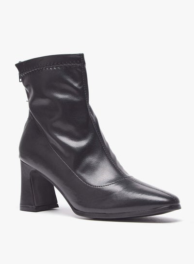 Buy Women Solid Boots with Zip Closure and Block Heels in UAE