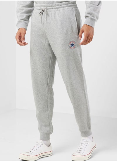 Buy Standard Fit Center Front Large Chuck Patch Sweatpants in Saudi Arabia