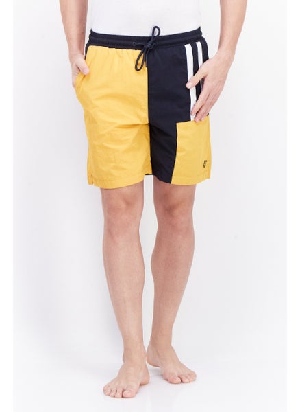 Buy Men Colorblock Brand Logo Board Shorts, Yellow/Navy in UAE