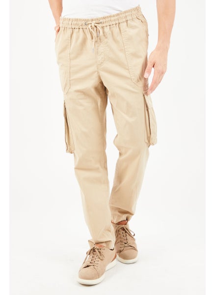 Buy Men Regular Fit Solid Cargo Pants, Tan in Saudi Arabia