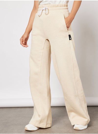 Buy Sportswear Studio Lounge Fleece Pants in UAE