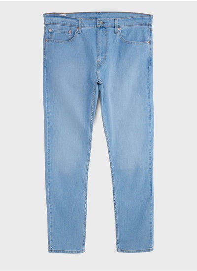 Buy Mid Wash Tapered Fit Jeans in UAE